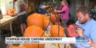 Pumpkin House carving underway