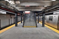 Midtown subway attack: Man stabbed, another shoved onto tracks in violent assault, cops say