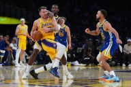 Luka Doncic scores 43 points, but Lakers fall to Warriors in season opener