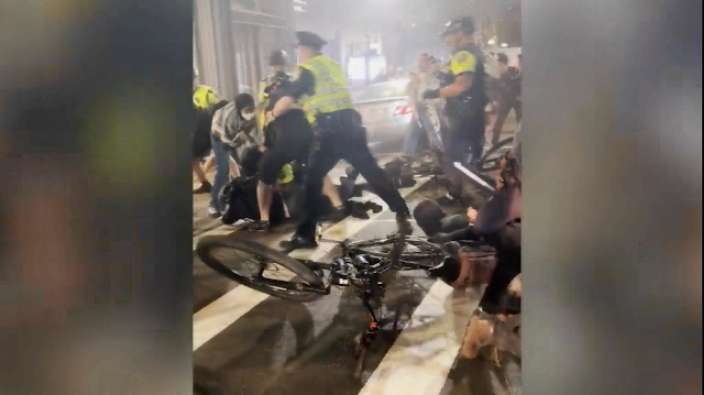 Six Boston protest suspects arraigned, seven due in court today