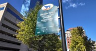 Lexington removing green wayfinding signs due to wear and damage