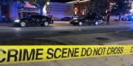 Gunmen kill two, injure 12 in a shootout in a crowd in Alabama capital city’s downtown