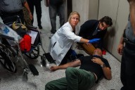 Federal agents grab and shove journalists outside NYC immigration court, sending one to hospital
