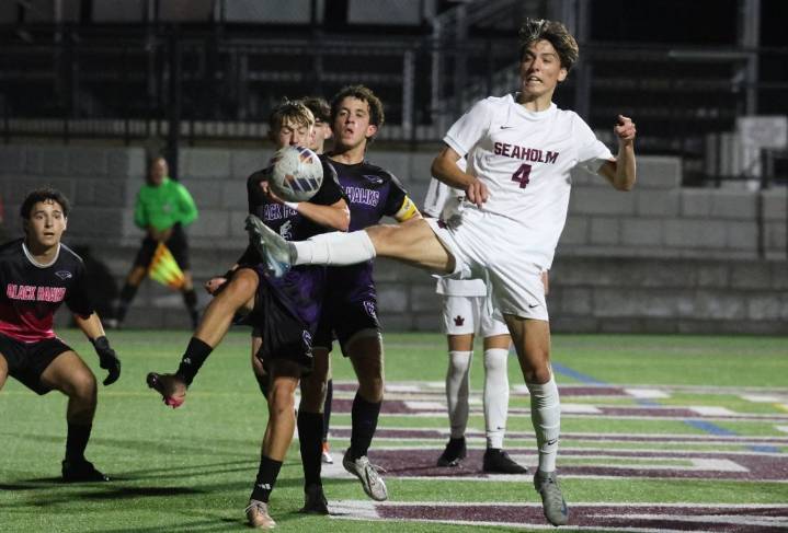 Photos from a D1 boys soccer district semifinal between Birmingham Seaholm and Bloomfield Hills