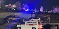 Crime tape blocks off area in apartment complex near UNR
