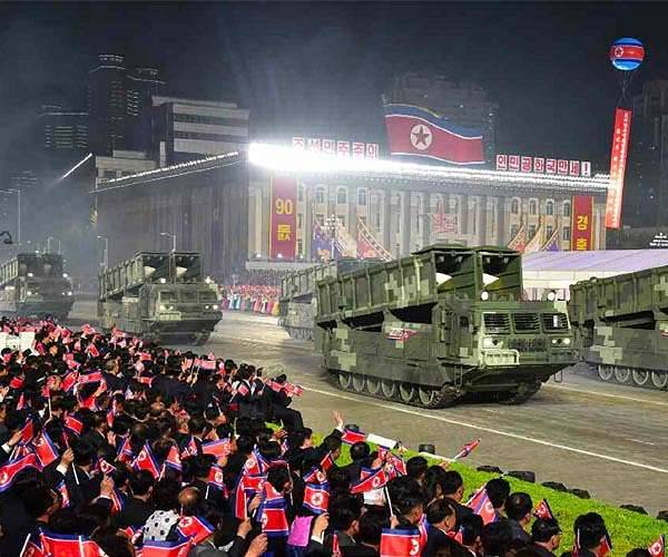 North Korea reports holding 'grand' military parade