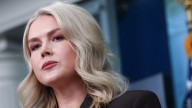 Karoline Leavitt's Latest Frumpy Fashion Fail Looks Ripped From Her Husband's Closet