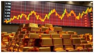 Gold Prices Fall As Investors Book Profits After Both Metals Hit Record Highs In Previous Session