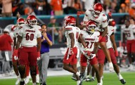 Louisville grabs 4 interceptions, stuns No. 2 Miami 24
