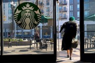 Starbucks halts 2-year sales slide, but costly improvements hurt its profits