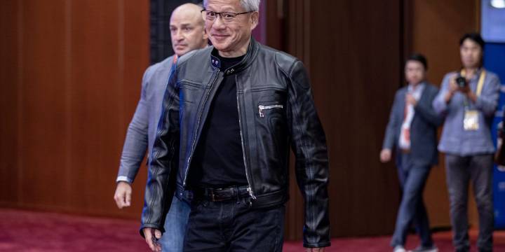 Nvidia is officially the world's first $5 trillion company. CEO Jensen Huang says it's on track for 'half a trillion dollars' in revenue