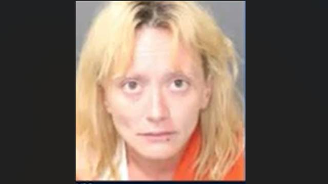 Shoplifting suspect arrested after holding onto son
