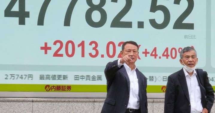 Asian markets mostly higher in quiet holiday trading after AI deals push Wall St to more records