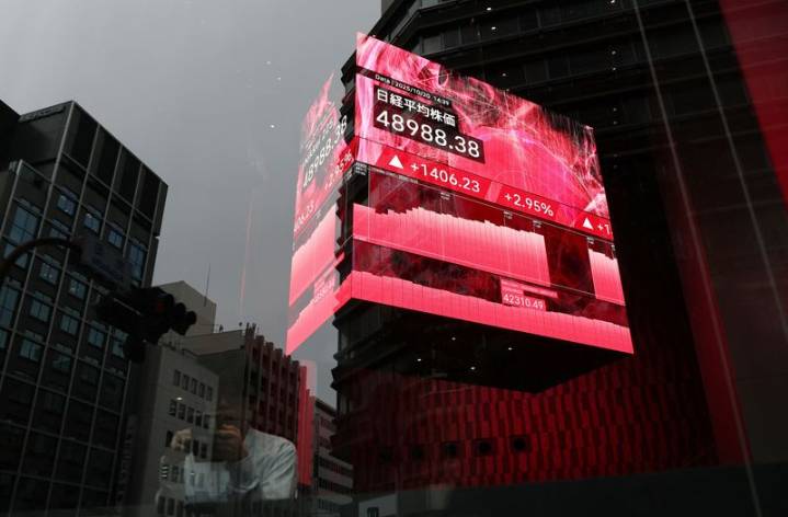 Japan's Nikkei climbs to record high on tech rally, posts best month in 3 decades