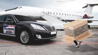Elizabeth Warren Sneaks Off Private Jet Under Large Cardboard Box