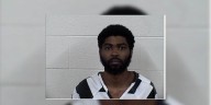 Man charged after body found in Panola Co. driveway