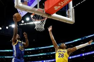 Warriors thump Lakers in NBA season opener