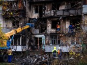 Russian overnight attack on Ukraine’s Kyiv kills at least 3, wounds dozens