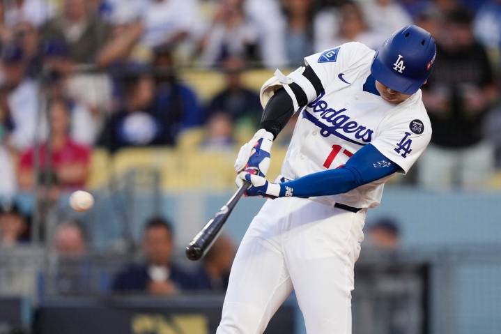 Ohtani hits leadoff homer for Dodgers in playoff opener against Reds