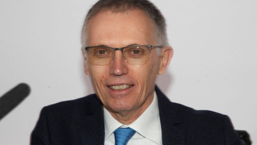 Ex-Stellantis CEO sees Tesla’s Musk pulling out of car industry