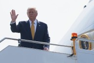 The Latest: Trump set to arrive in Japan, where he'll meet new Prime Minister Takaichi