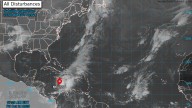NHC tracking Tropical Storm Melissa, tropical wave