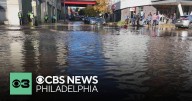 Cars stuck as muddy water floods North Philadelphia streets due to water main break near Temple