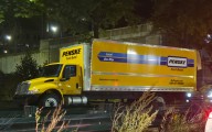 A most satisfying storrowing: A newly roofless rental truck split at the seams