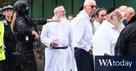 His robe stained with blood, a rabbi led his defiant Manchester congregation in prayer