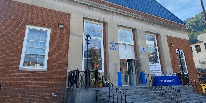 Logan Post Office reopens after months long closure