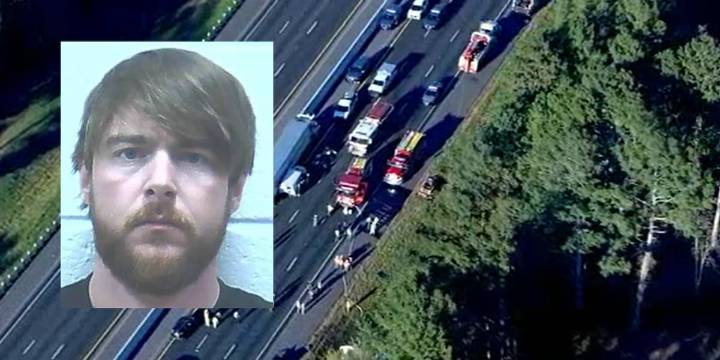 Truck driver charged in deaths of 8 family members on interstate highway