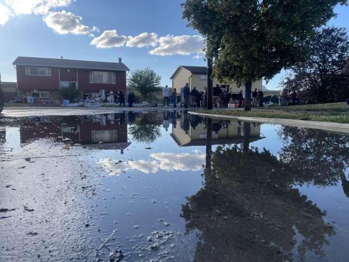 'Water is all the way to our knees'; Rose Park homeowners clean up after flooding