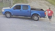 Logan County law enforcement seeking man after dogs thrown over fence