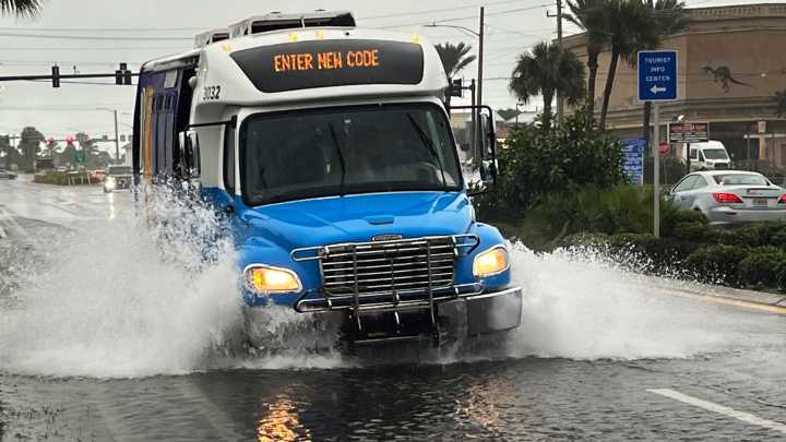 Downpour floods roads