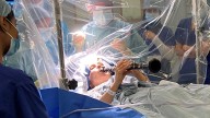 A Parkinson’s patient plays clarinet during Deep Brain Stimulation surgery