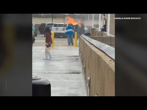 New video shows person being rescued from burning car at Woodfield mall parking garage