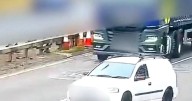 Shock video shows motorist almost reverse into lorry after missing motorway exit