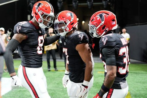 Falcons ride Robinson's 170 rushing yards, including 81