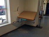 Woman crashes into post office in Watford City