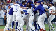 Dodgers win in 11 innings after Orion Kerkering's costly error