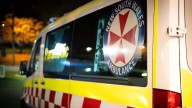 Rider arrested after man, 65, dies after being struck by e-bike on footpath in Toongabbie, Sydney’s west