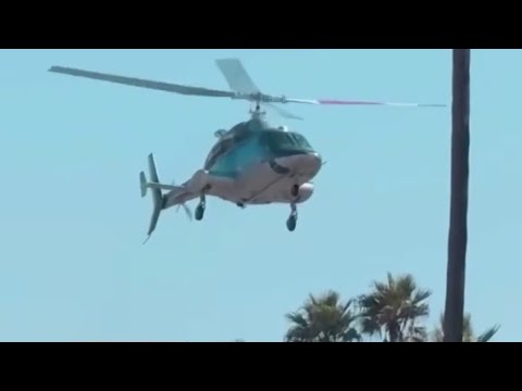 Helicopter spins out of control before crash in Huntington Beach
