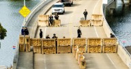 Shots fired, driver hurt and held after truck rams into Coast Guard base in San Francisco