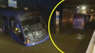 Bus RED queda atrapado dentro de paso bajo nivel en San Bernardo: Camino está anegado por aguas servidas