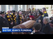 Mourners gather to say goodbye to Sister Jean at funeral