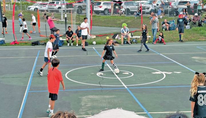 Halloween futsal lights up Kona courts