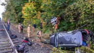 3 rescued after 2 vehicles crash over embankment in Northwest Portland
