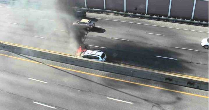 2 injured after car fire on I-90 WB, semi truck flips on I