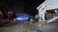 Woman dies after car crashes into Illinois home and catches fire, officials say