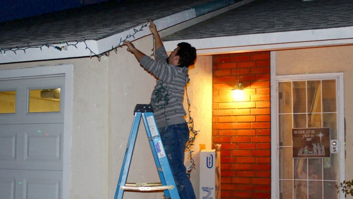 Local Father Invents 47 New Cuss Words While Putting Up Christmas Lights